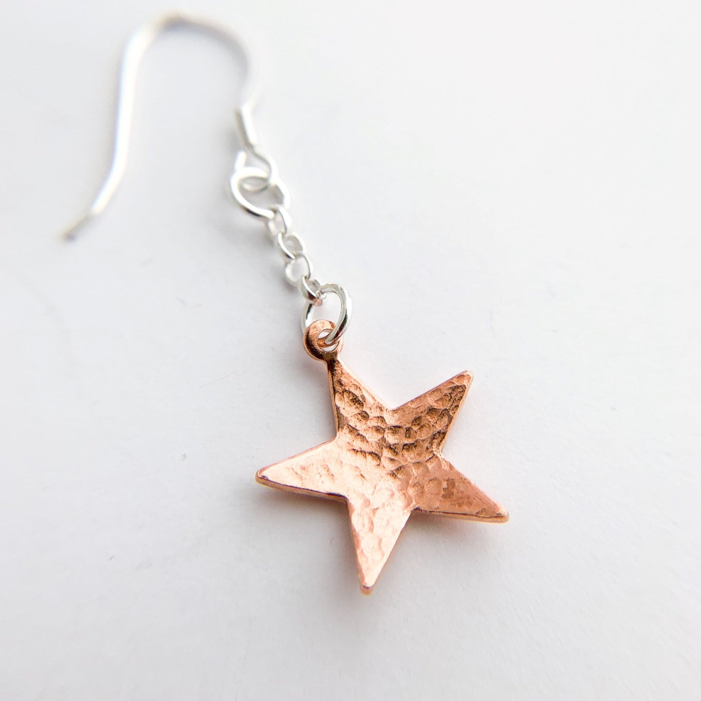 Small Copper Hammered Dangly Star Earrings